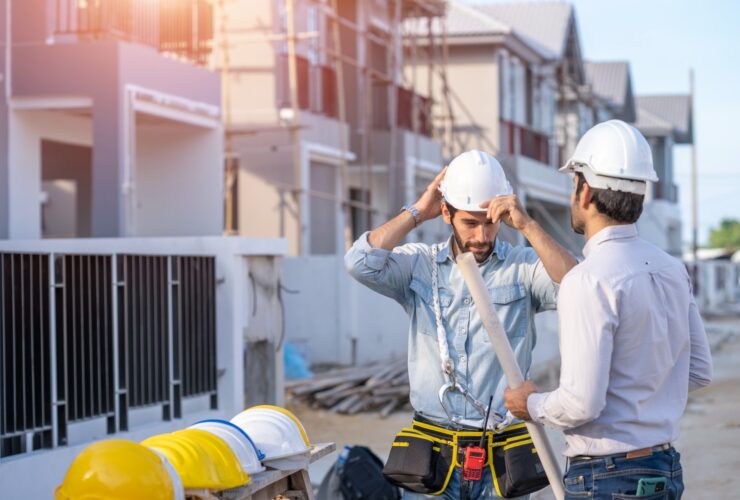 Architect Foreman And Worker Discussing In Buildin 2023 11 27 05 17 59 Utc