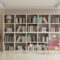 Library In The Living Room With Pink Armchair On E 2023 11 27 05 08 31 Utc