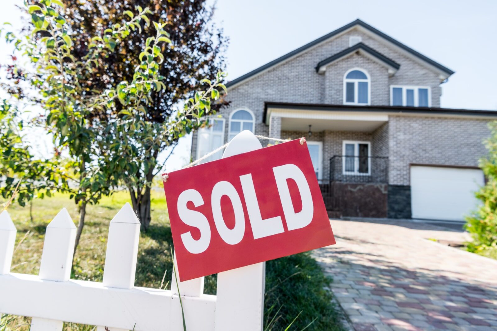 Beautiful New House With Sign Sold Hanging On Fenc 2023 11 27 05 10 01 Utc