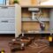 Open Cabinet Of Kitchen Counter With Metallic Sink 2023 11 27 05 04 08 Utc