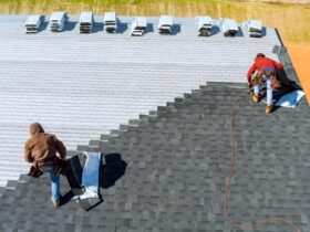 Worker Hands Installing Bitumen Roof Shingles With 2023 11 27 04 50 47 Utc