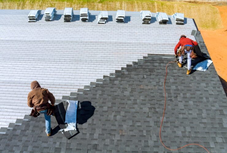 Worker Hands Installing Bitumen Roof Shingles With 2023 11 27 04 50 47 Utc