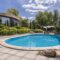 Oval Swimming Pool In Big Garden 2023 11 27 05 07 42 Utc