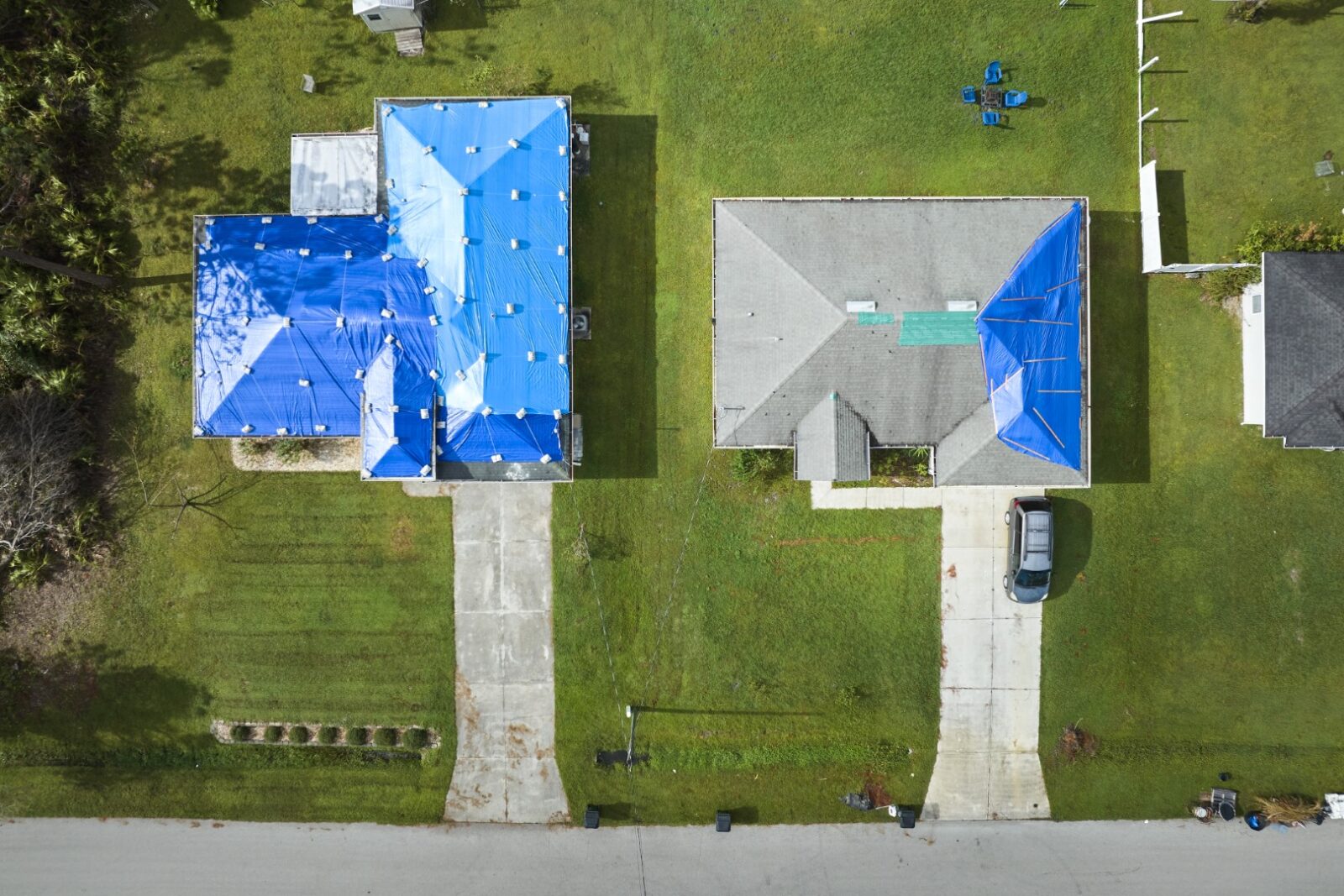 Hurricane Ian Damaged House Rooftops Covered With 2023 11 27 05 31 26 Utc