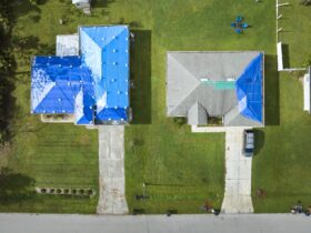 Hurricane Ian Damaged House Rooftops Covered With 2023 11 27 05 31 26 Utc