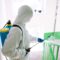 Man In Hazmat Suit Protective Gloves And Goggles 2023 11 27 05 27 00 Utc