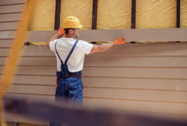 Smiling Male Worker Building Cabin At Construction 2023 11 27 04 52 36 Utc