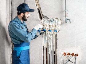 Workman Installing Water Heating System 2023 11 27 05 31 01 Utc