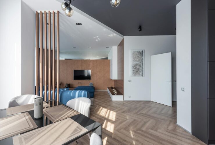 Modern apartment with table near living room