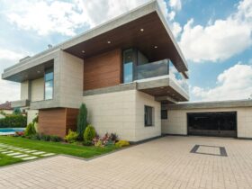 brown and white wooden house under blue sky