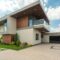 brown and white wooden house under blue sky