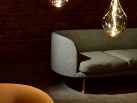 three edison light bulbs beside the sofa