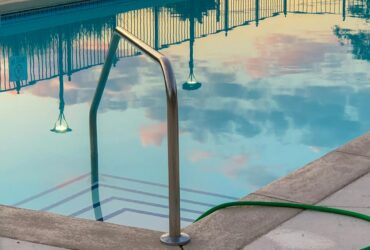 A tranquil pool reflecting the evening sky, showcasing peace and relaxation.