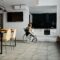 photo of woman on wheelchair going to the kitchen