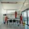 Team of professional cleaners working in a spacious, modern indoor setting.