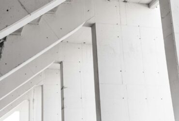 Abstract view of modern concrete pillars showcasing minimalist architectural design.