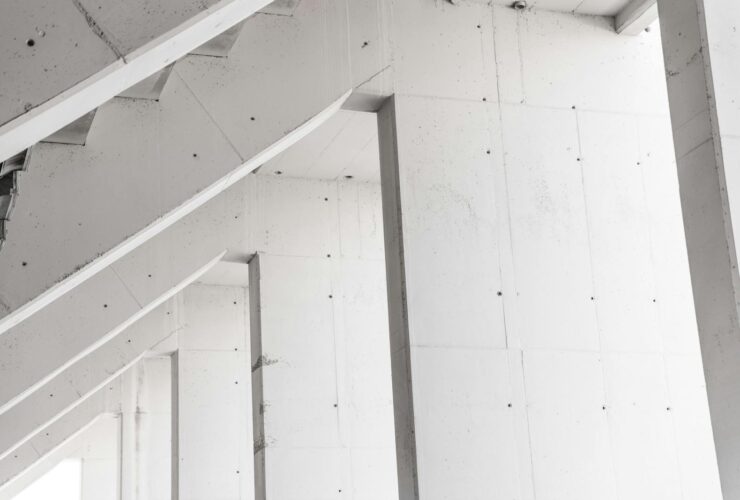 Abstract view of modern concrete pillars showcasing minimalist architectural design.