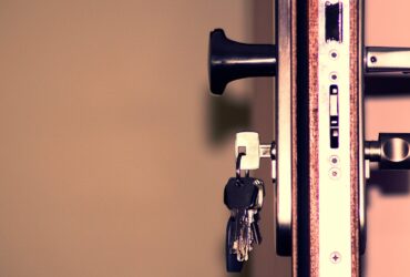 Detailed view of a door lock and keys emphasizing security and access.