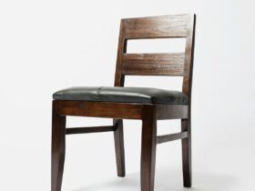 Elegant minimalist wooden chair with leather seat, perfect for modern interiors.