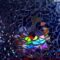 A colorful rainbow reflection through broken glass, creating an artistic and abstract effect.