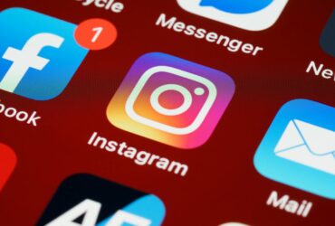 Vibrant close-up of popular social media app icons on a smartphone screen.