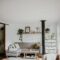 Warm and inviting Scandinavian-style living room with neutral decor and indoor plants.