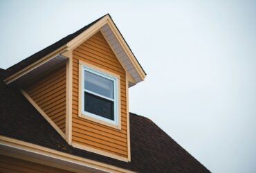 brown wooden house under white sky during daytime