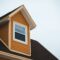 brown wooden house under white sky during daytime