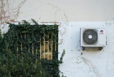 a air conditioner mounted to the side of a building
