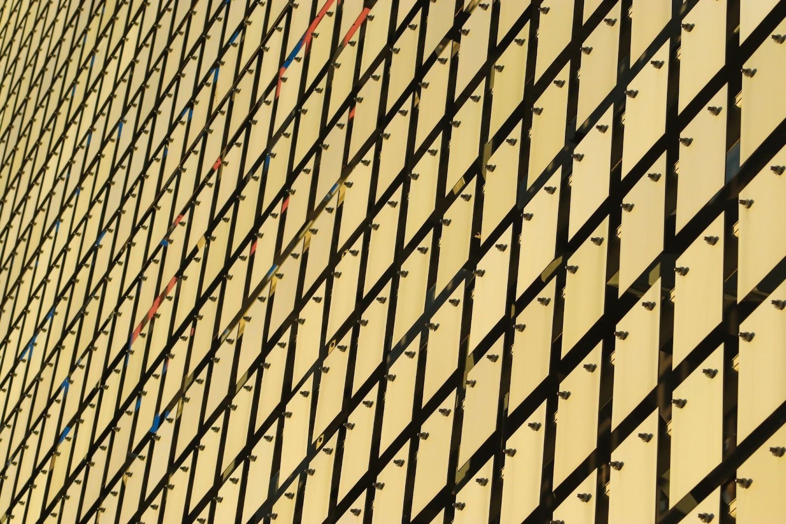 Kinetic Facade Of The Building. Metal Plates In Brushed Stainless Steel Are Suspended Freely And Swing In The Wind