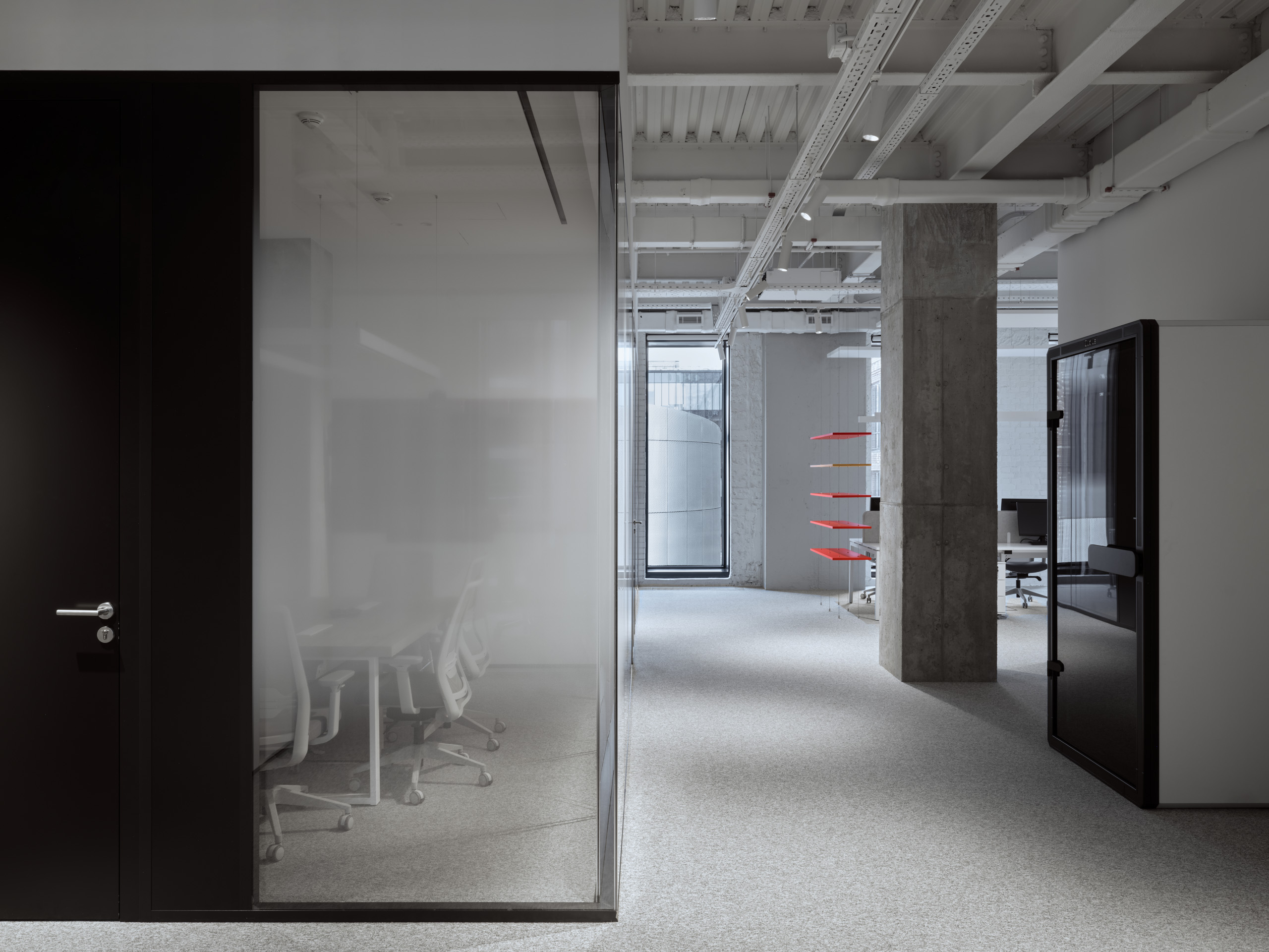 DKC office Moscow dark corridor with glass partitions and red accent lighting