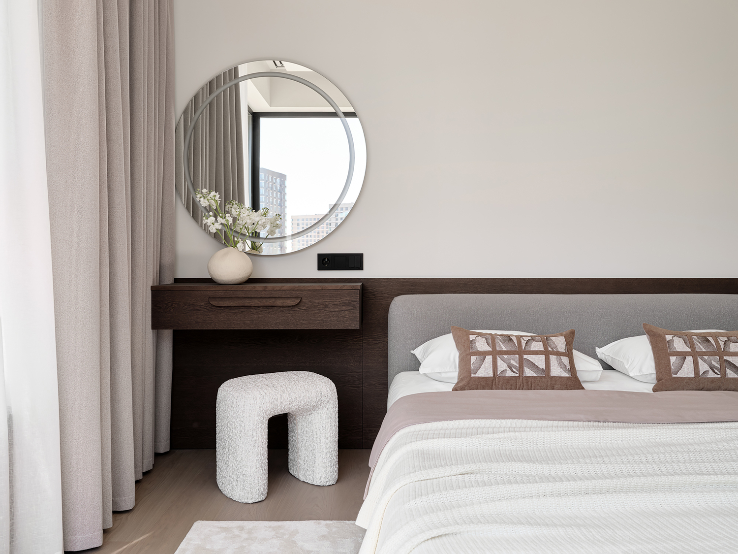 Bedside vanity table with round backlit mirror and upholstered stool