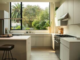 modern kitchen with island and large window