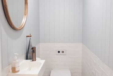 white ceramic sink with stainless steel faucet